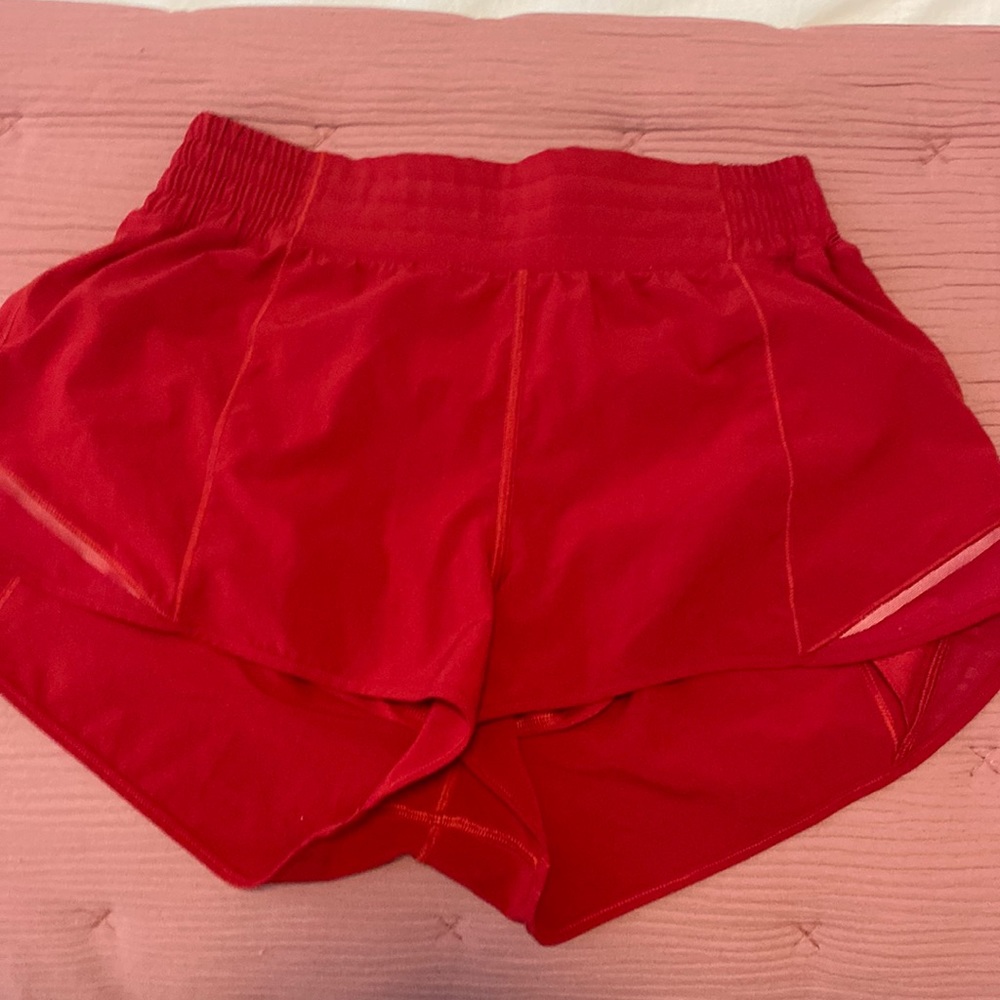 Perfect condition dark red Lululemon hottie hot HR 2.5” shorts size 8